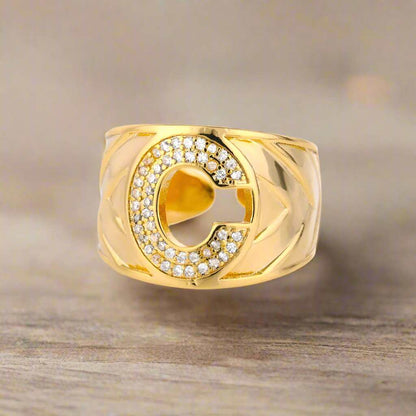 YourLetter Chunky Ring in gold with personalized initial "C" design, adjustable fit, and elegant finish.