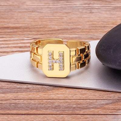 Yourletter Chunky Embossed Ring with imitation gems and gold finish featuring a customizable letter.