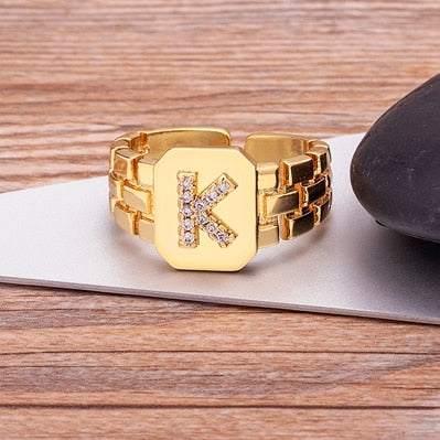 Gold Yourletter Chunky Embossed Ring with imitation gems and customizable letter.