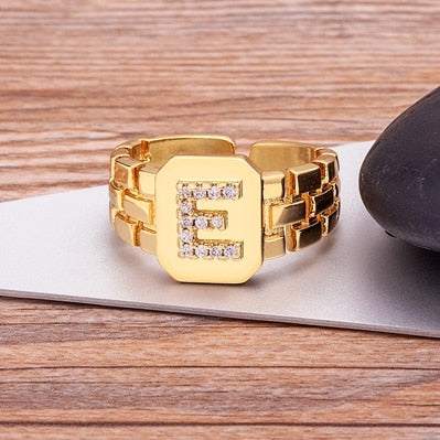 Yourletter Chunky Embossed Ring with imitation gems and gold finish.