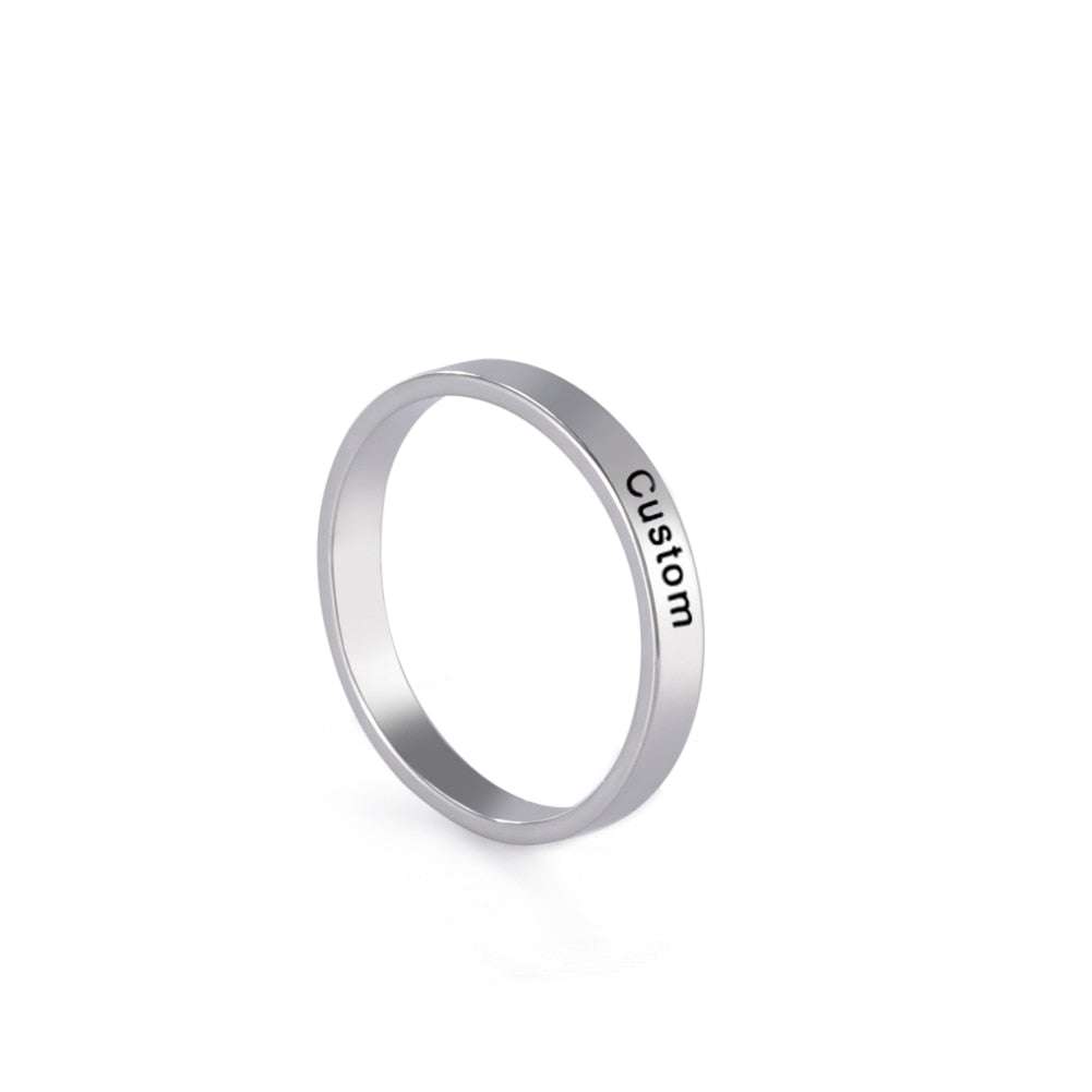 Custom engraved ring in silver, available in gold and rose gold, personalized with engraving options, 2mm and 3mm widths.