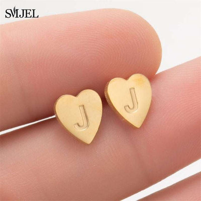 YourLetter Heart Stud Earrings with engraved initial in gold finish.