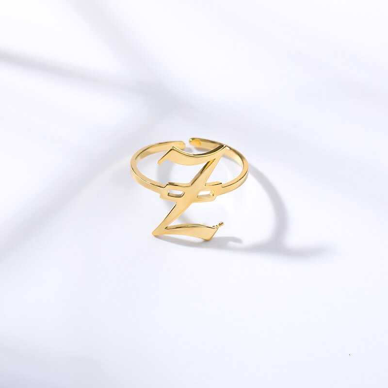 Vintage Lettering Style Ring with Old English design in gold, adjustable, customizable A-Z initial.