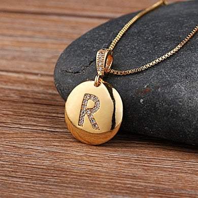 YourLetter Jeweled Pendant Chain with gold color chain and gem-encrusted letter pendant.