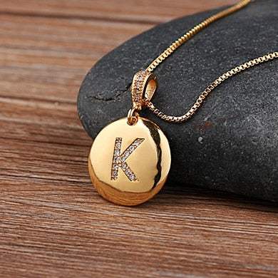 Elegant gold YourLetter Jeweled Pendant Chain with gem-encrusted letter K.