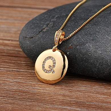 YourLetter Jeweled Pendant Chain with gem-encrusted letter on gold chain.