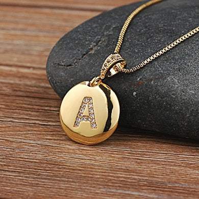 YourLetter Jeweled Pendant Chain with gem-encrusted letter on gold color chain.