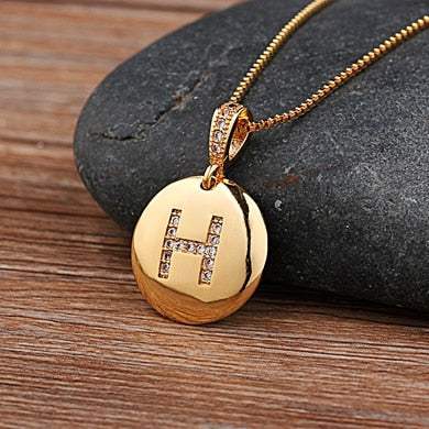 YourLetter Jeweled Pendant Chain with gold chain and gem-encrusted letter.