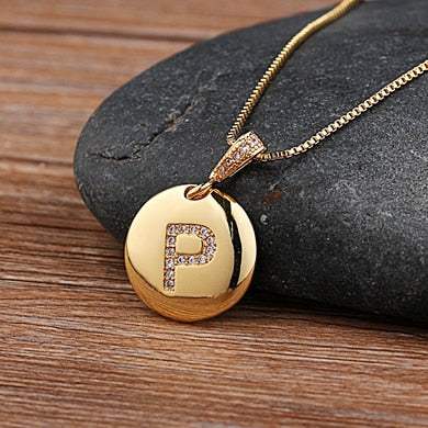 YourLetter Jeweled Pendant Chain with gold color chain and gem-encrusted letter pendant.