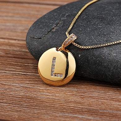 YourLetter Jeweled Pendant Chain with gold chain and gem-encrusted letter.