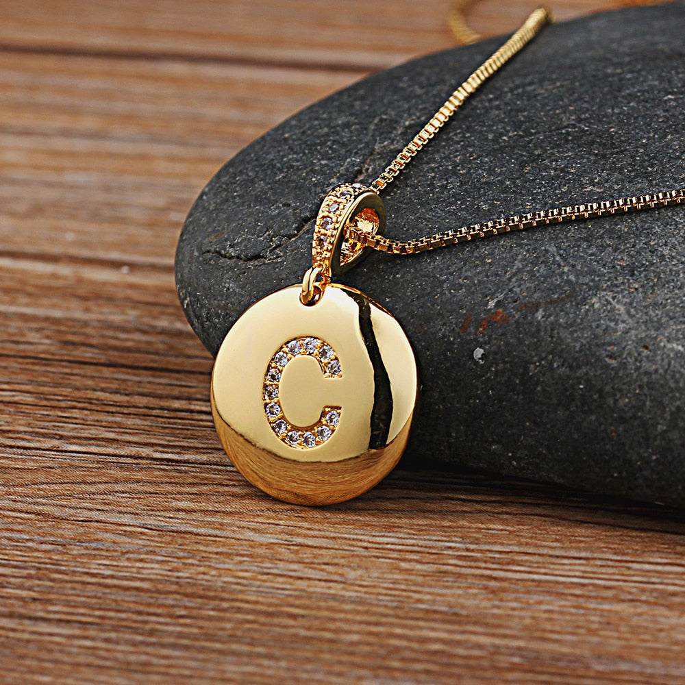 YourLetter Jeweled Pendant Chain with gold color chain and gem-encrusted letter C pendant.