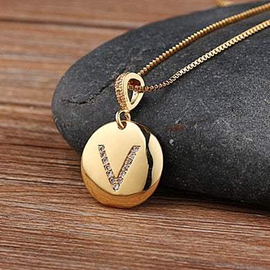 YourLetter Jeweled Pendant Chain with gem-encrusted letter on gold chain.