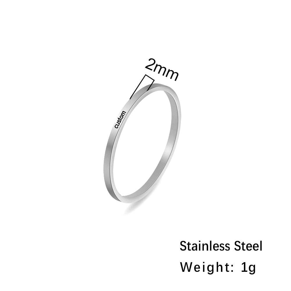 Custom engraved ring in silver, 2mm width, personalized metal alloy.