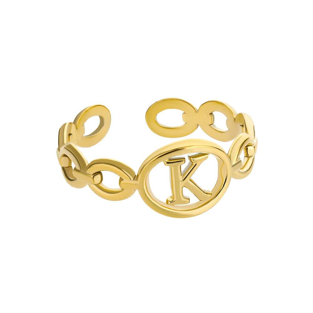 Hollow Loop Ring with customizable initial and adjustable gold band.