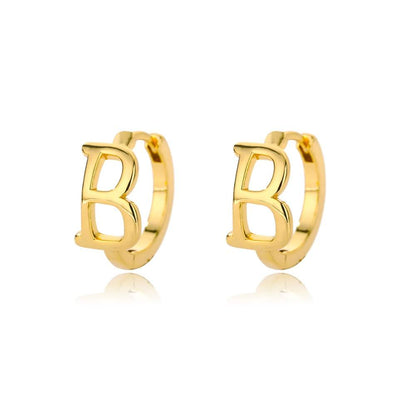 Gold initial loop earrings featuring customizable letters A-Z.