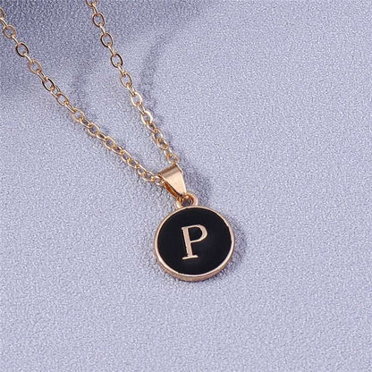 YourLetter Black Enamel Necklace with gold alloy and customizable letter pendant.