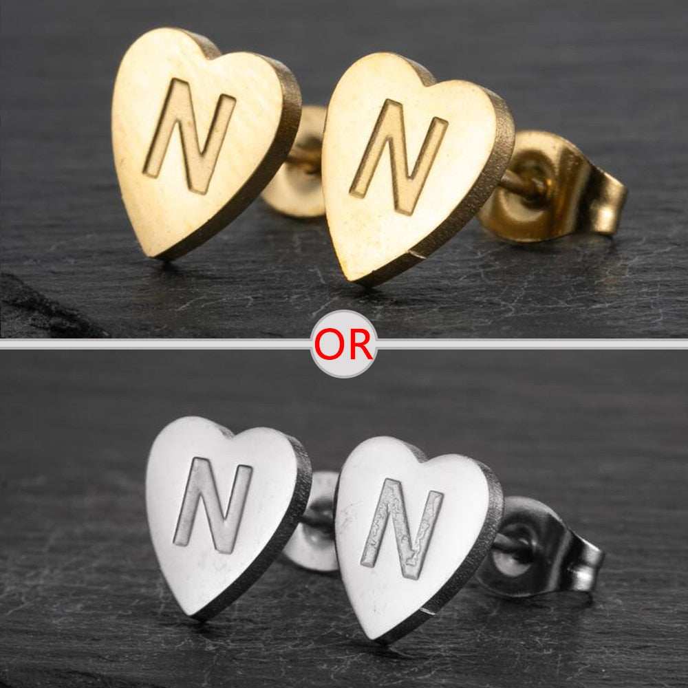 Personalized YourLetter Heart Stud Earrings in silver and gold finish.