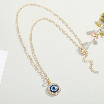 Elegant Evil Eye Necklace with gold and silver finishes and gem frame on 50cm chain.