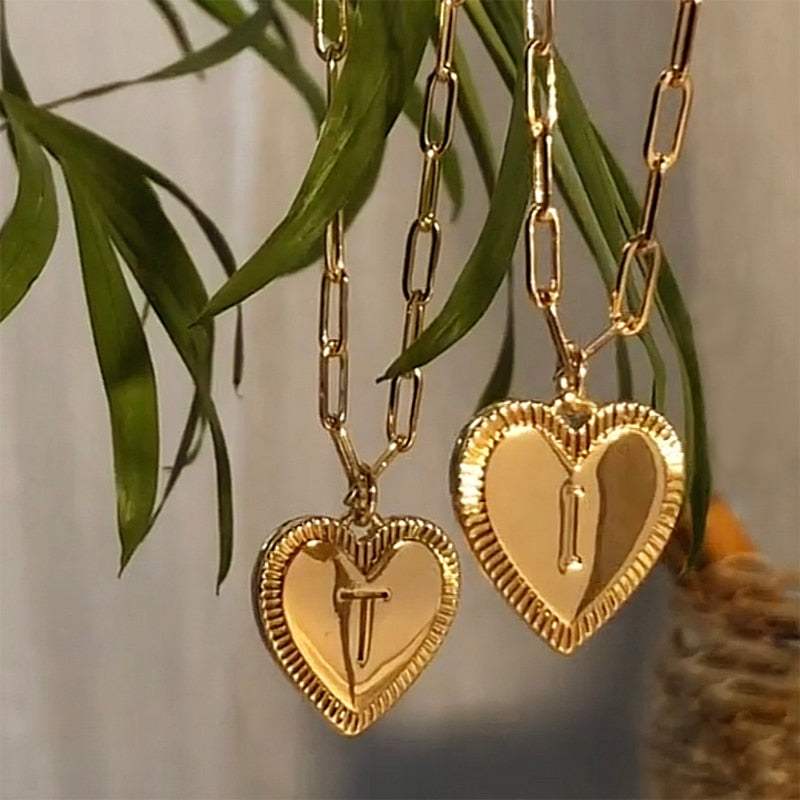 Gold YourLetter Heart Necklace with personalized letter pendant.