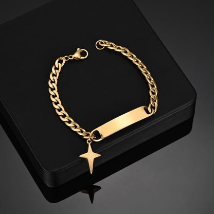 Engraved nameplate bracelet with Cuban chain and star pendant in gold.