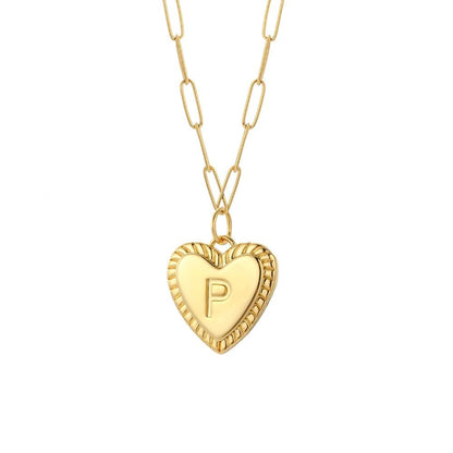 Gold heart-shaped necklace with customizable letter design.