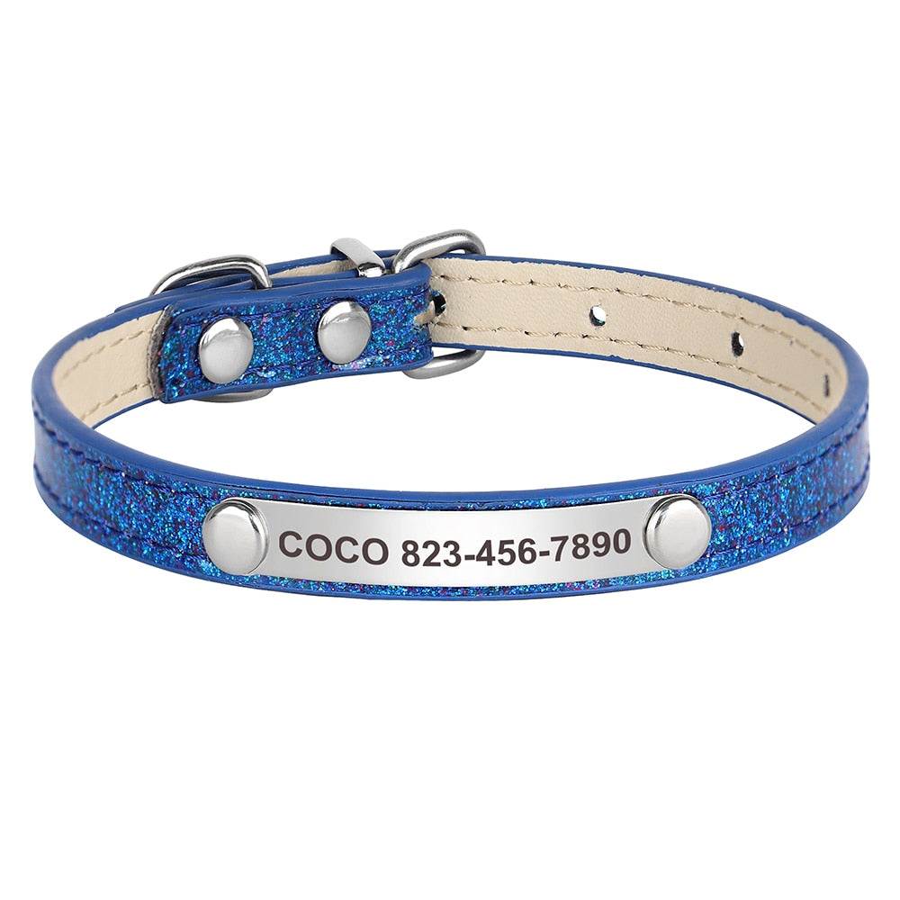 Engraved sparkly cat collar in blue, personalized with pet name and phone number.