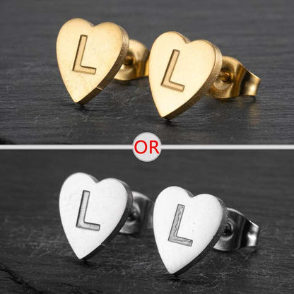 Heart-shaped stud earrings with personalized initial, available in silver and gold finish, perfect for versatile wear.