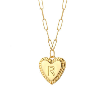 Gold YourLetter Heart Necklace with customizable initial pendant.