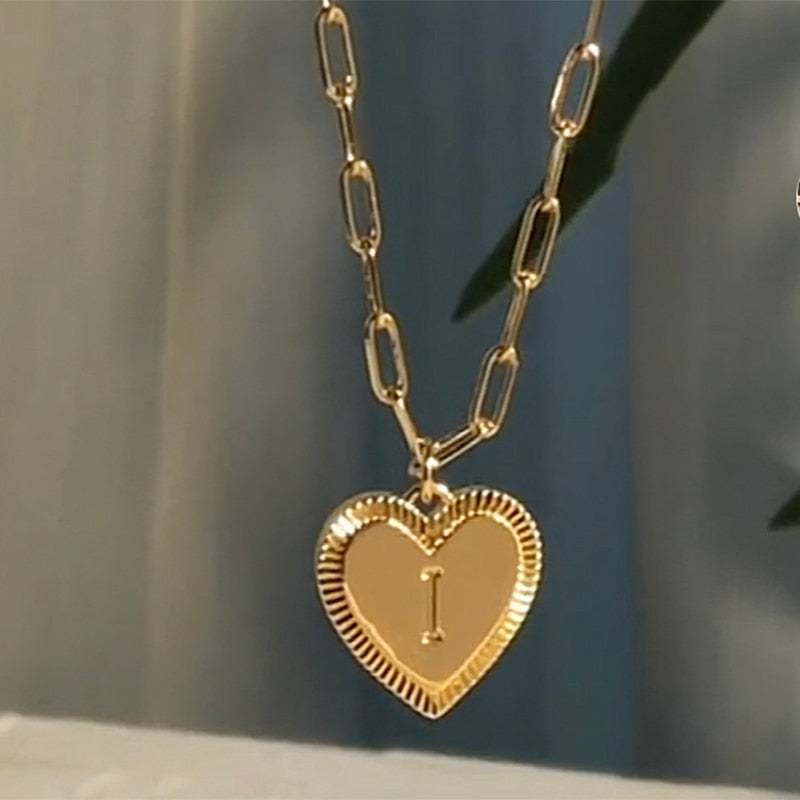 Gold-colored personalized YourLetter Heart Necklace with customizable letter.