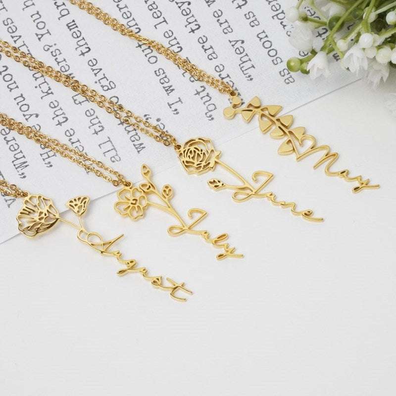 Birth Month Flower Custom Name Necklace in gold with floral design.