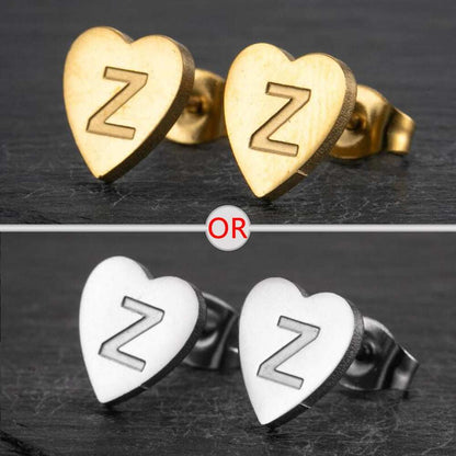 Heart-shaped stud earrings with personalized initial, available in silver and gold finish, versatile for any occasion.