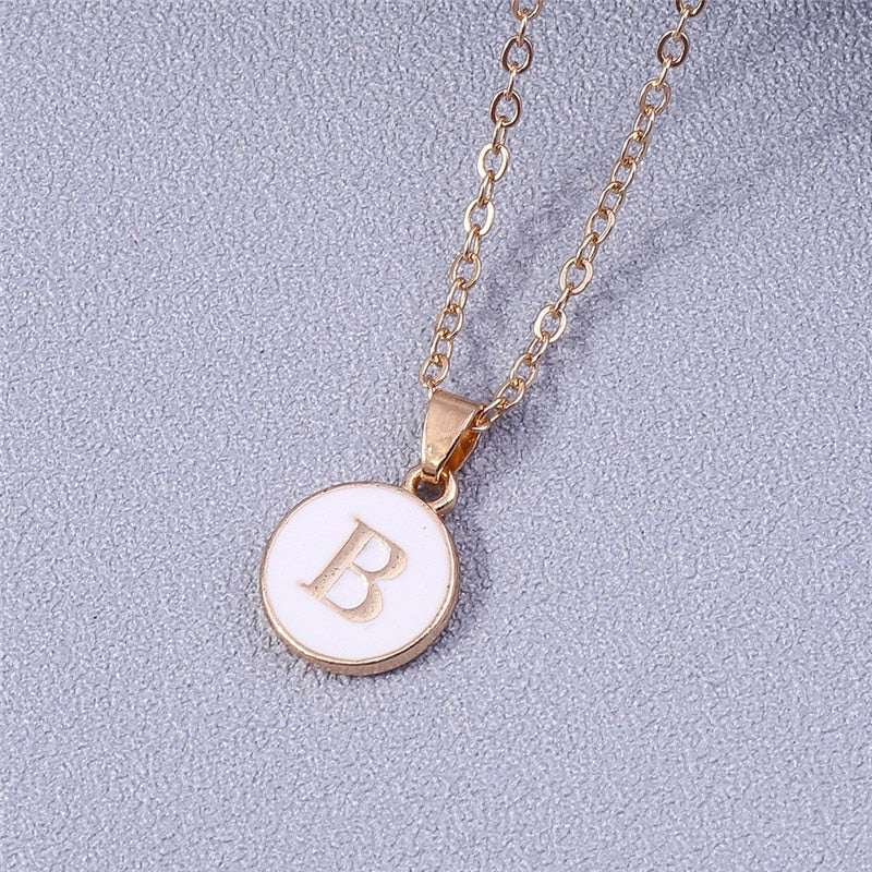 YourLetter White Enamel Circle Necklace with Gold Letter Pendant.