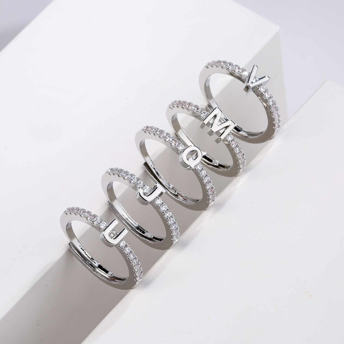 Custom Letter Personalized Ring with adjustable size and imitation gems in silver.