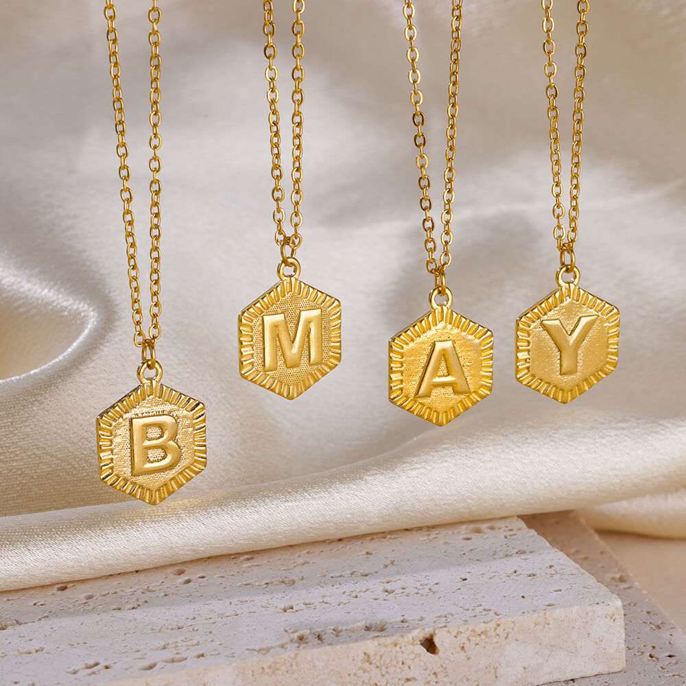 Hexagon embossed letter necklace in gold finish from YourLetter.