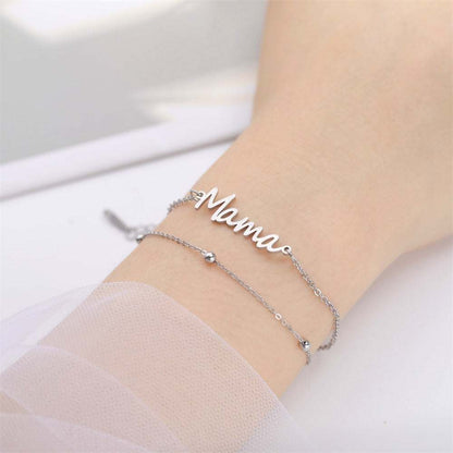 Mama bracelet in silver with nameplate, multiple style choices available.