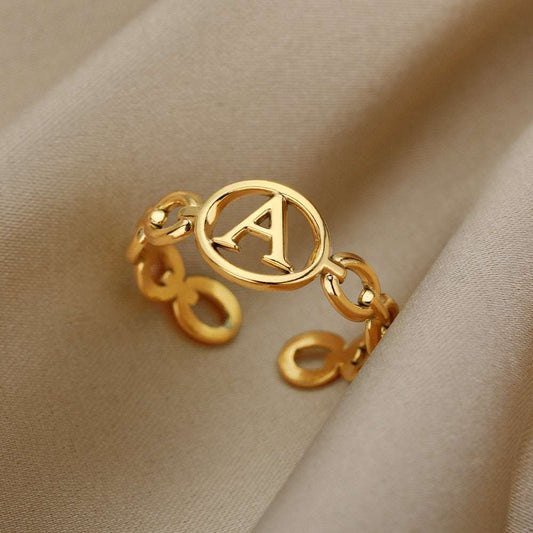 Customizable Hollow Loop Ring with initial letter A in gold.