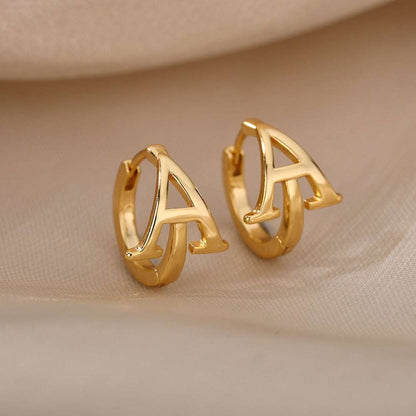 Gold initial loop earrings with customizable A-Z letter design.