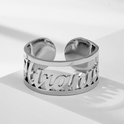 Hollow custom name ring in silver, adjustable size, personalized engraving.