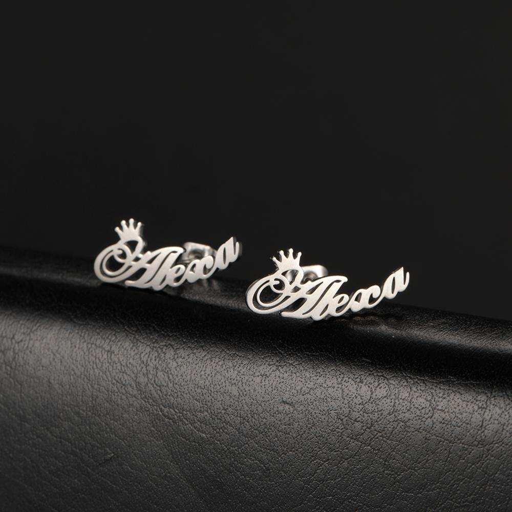 Custom name stud earrings with 18 font options in silver finish.